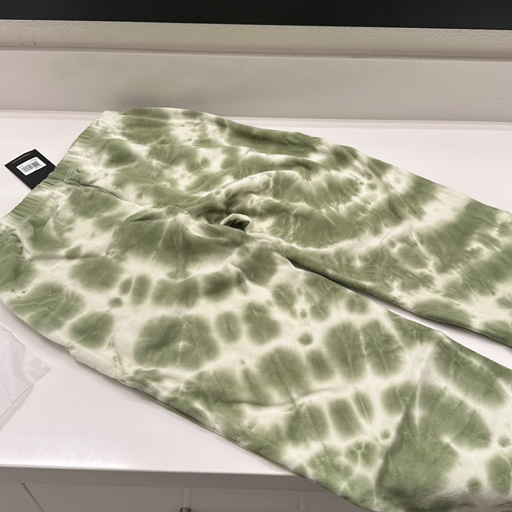 Brand New Girls Sweats in a green Camo color